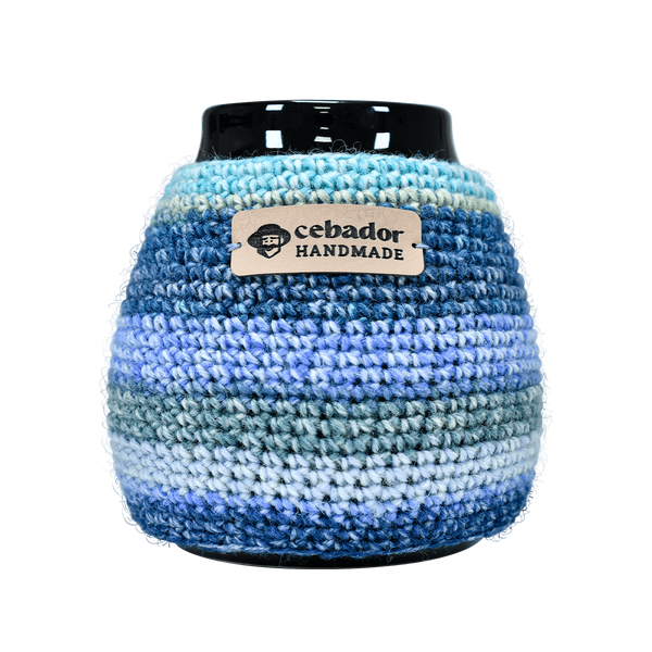 Handgemaakte kalebaswarmer Dolores op een kalebas